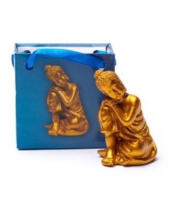 Statue de Bouddha miniature doré en position de relaxation